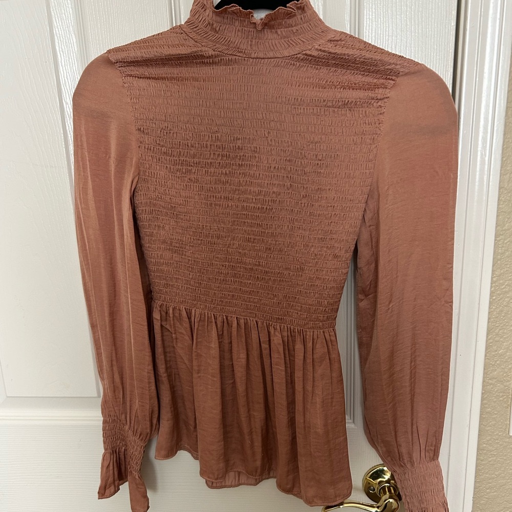 VICI silk turtle neck blouse.